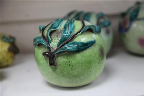 A pair of Chinese enamelled porcelain models of peaches, 19th century, 16cm